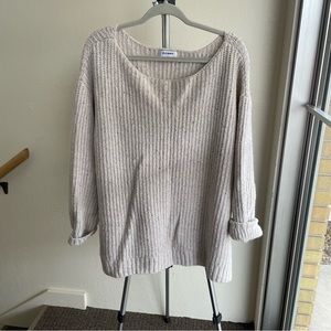 Cream sweater with speckled color flecks throughout